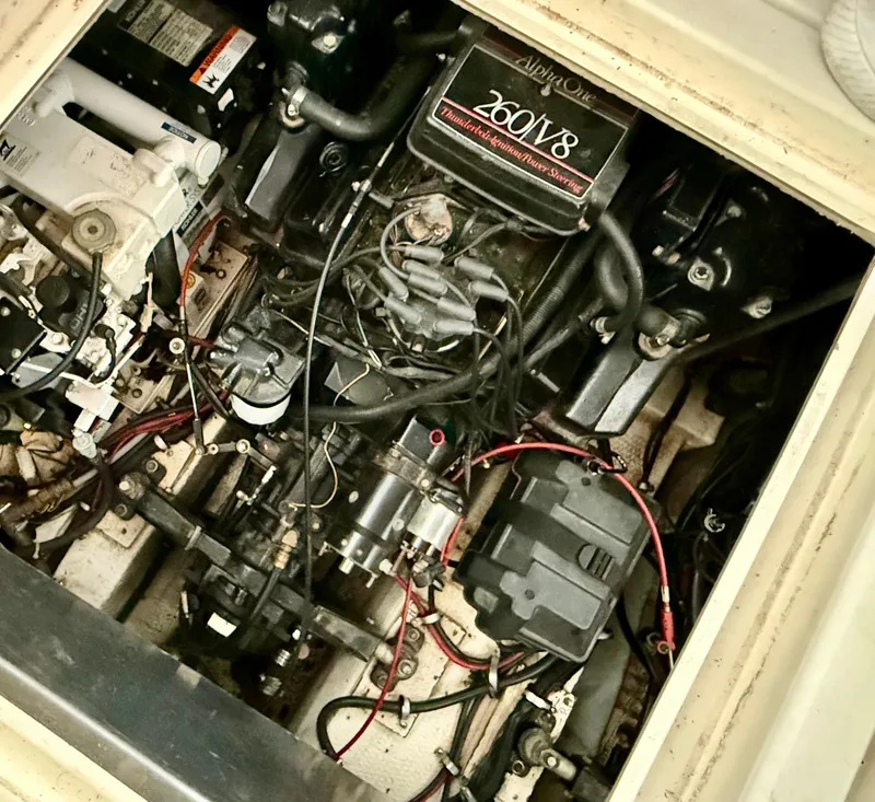 Slide: The Image of Engine compartment of 1986 Cruisers Yachts 297 Elegante with 260 V8 engine. - 24