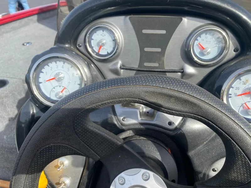 Slide: The Image of Dashboard of 2022 Tracker Pro Team 175 TXW boat with gauges and steering wheel. - 18