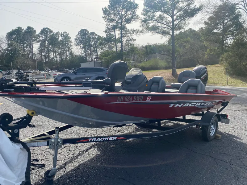 Slide: The Image of 2022 Tracker Pro Team 175 TXW boat on trailer, parked outdoors. - 8