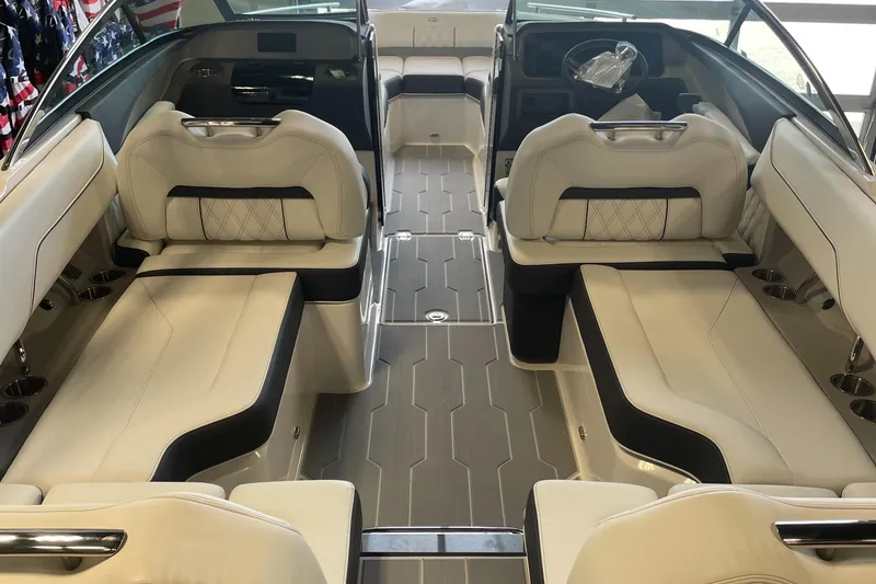 Slide: The Image of 2025 Regal LS4 Surf boat interior with luxurious seating and modern design. - 2