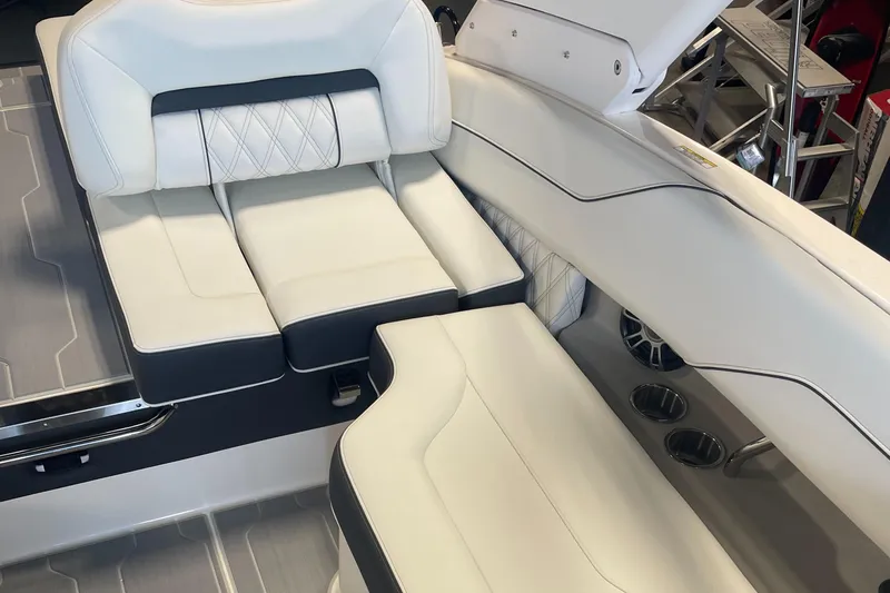 Slide: The Image of 2025 Regal LS4 Surf boat interior with white leather seating and modern design. - 4