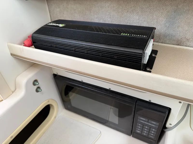 Slide: The Image of 2001 Grady-White Sailfish 274 interior with microwave and power inverter. - 30