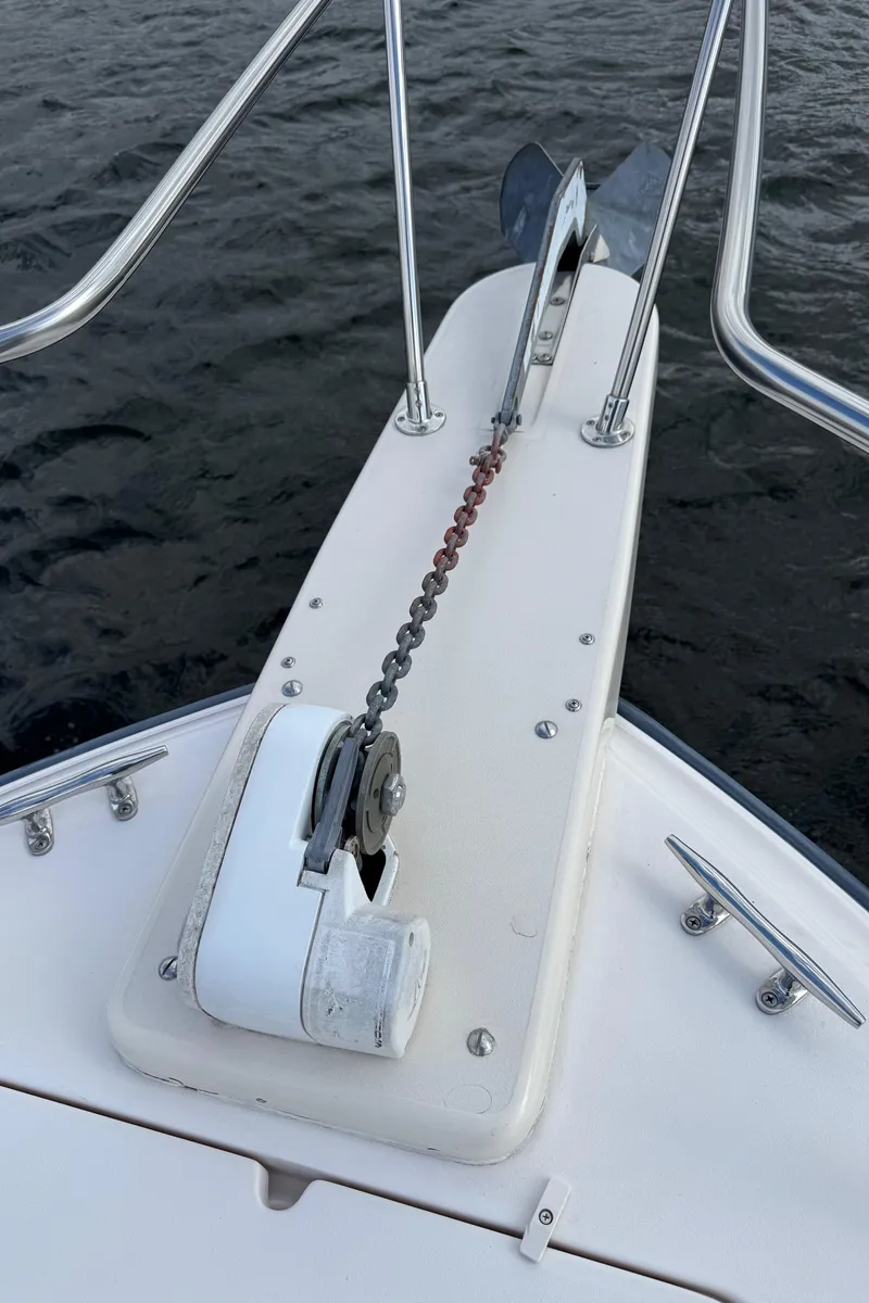 Slide: The Image of 2001 Grady-White Sailfish 274 anchor system on calm water. - 33