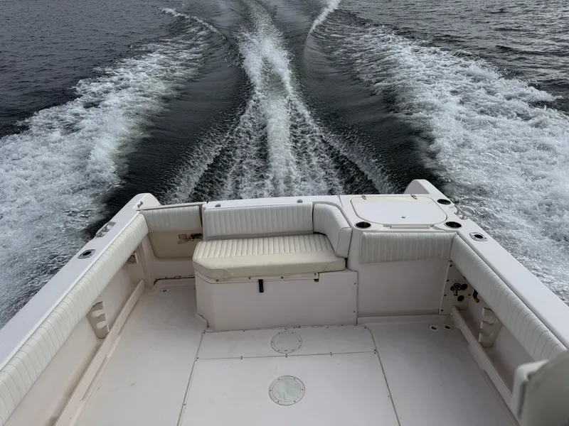 Slide: The Image of 2001 Grady-White Sailfish 274 boat cruising, leaving a wake on the water. - 38