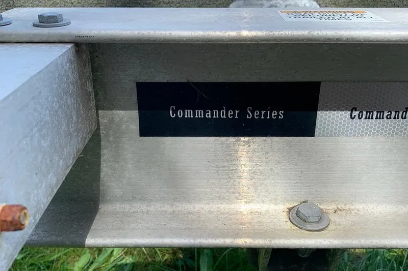 Slide: The Image of Trailer with "Commander Series" label for 1999 Grady-White Sailfish 274 boat. - 44