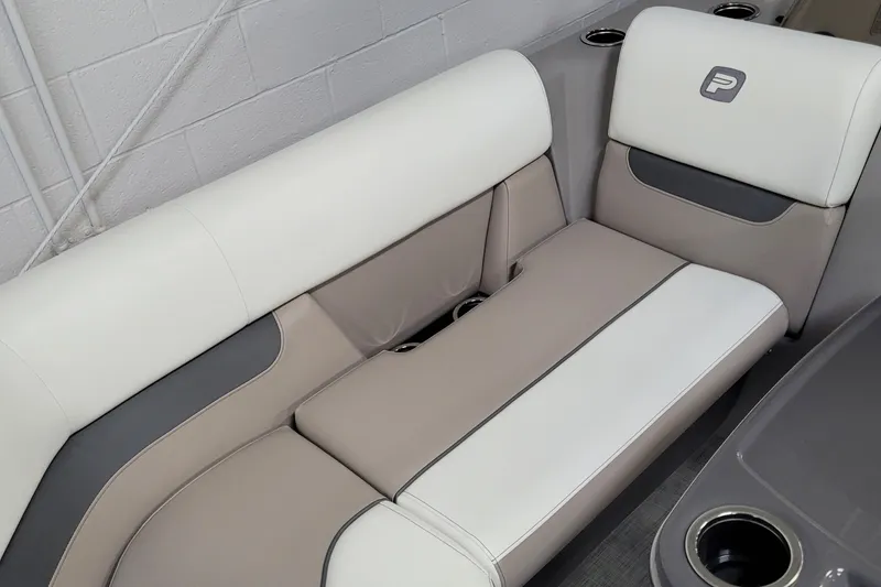 Slide: The Image of 2025 Princecraft Vectra 21 RL boat seating with beige and white upholstery. - 2