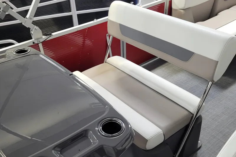 Slide: The Image of 2025 Princecraft Vectra 21 RL boat interior with gray and white seating and cup holders. - 6