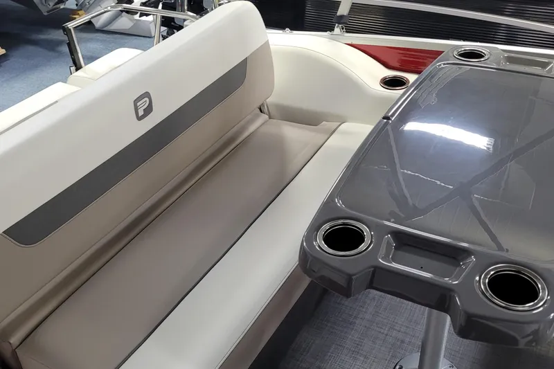 Slide: The Image of 2025 Princecraft Vectra 21 RL boat interior with seating and table. - 7