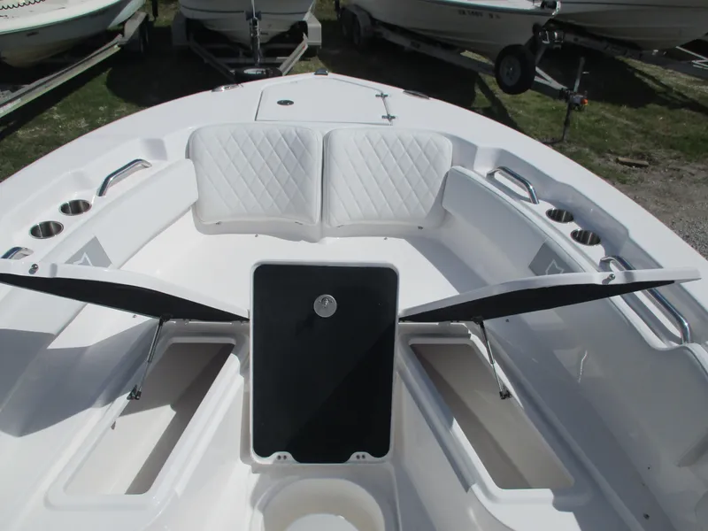 Slide: The Image of 2025 Sea Fox 248 Commander boat interior with seating and storage compartments. - 8