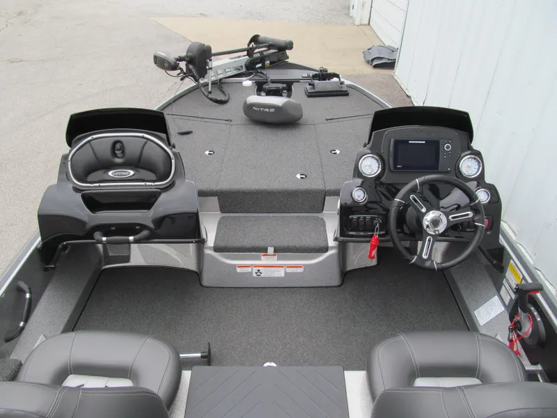 Slide: The Image of 2021 Nitro Z17 boat interior with dual consoles and steering wheel. - 5