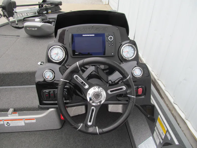 Slide: The Image of Steering console of a 2021 Nitro Z17 boat with gauges and a Humminbird display. - 6