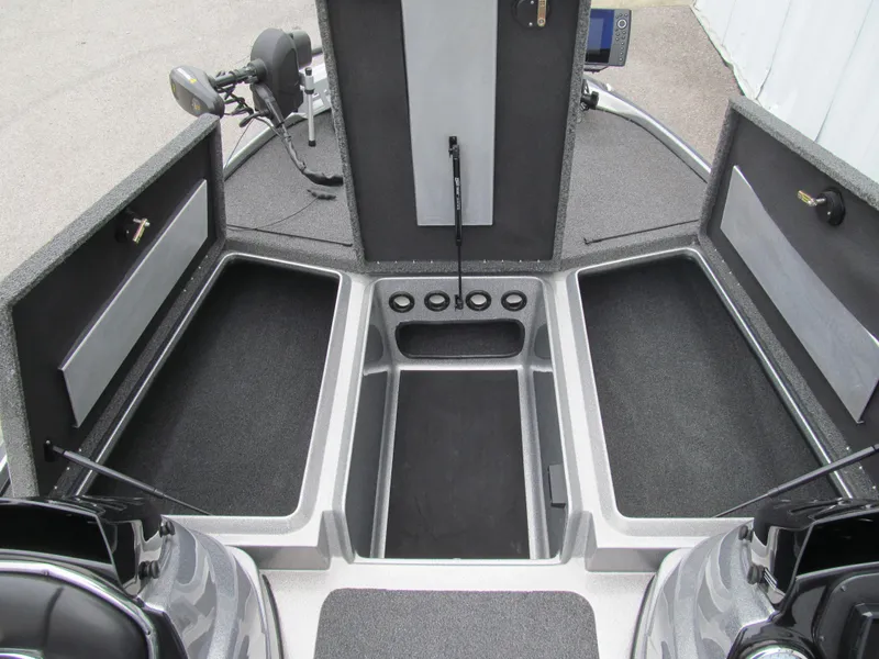Slide: The Image of 2021 Nitro Z17 boat interior with open storage compartments and carpeted flooring. - 7