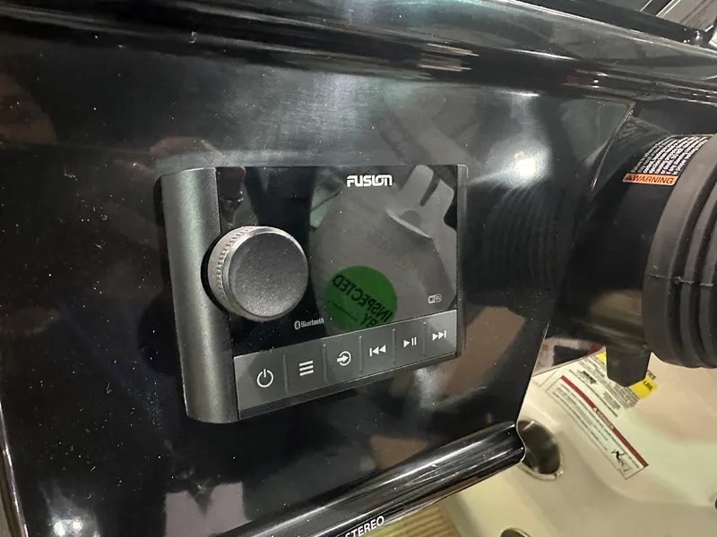 Slide: The Image of Fusion stereo system on 2025 Sea Ray SPX 190 boat dashboard. - 16