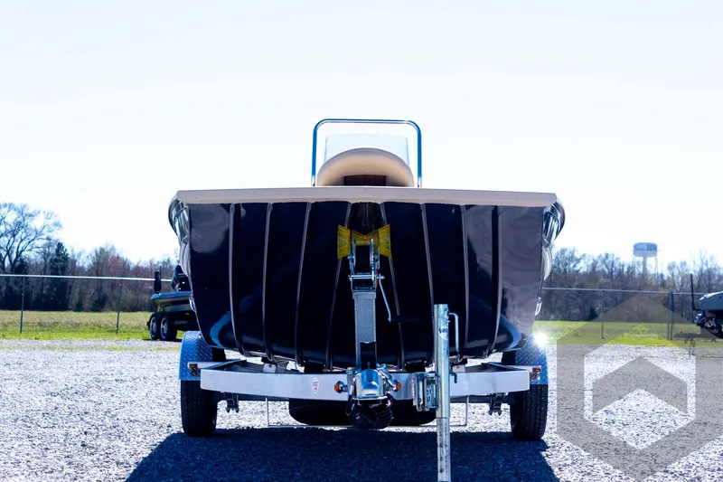 Slide: The Image of 2025 G3 Bay 20 boat on trailer, rear view in outdoor setting. - 14