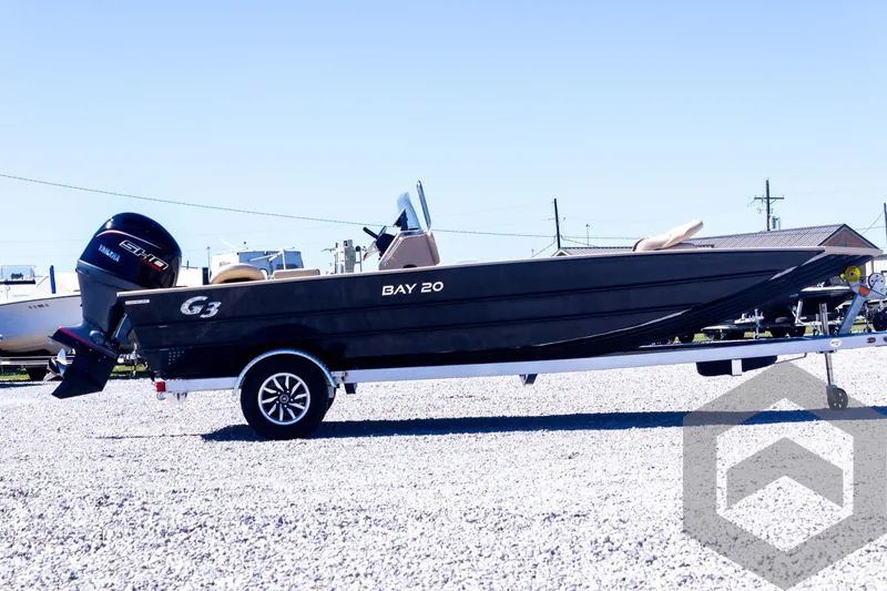 Slide: The Image of 2025 G3 Bay 20 boat on trailer, side view, outdoors. - 16