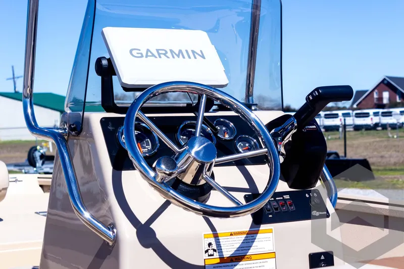 Slide: The Image of Steering console of 2025 G3 Bay 20 boat with Garmin navigation system. - 26