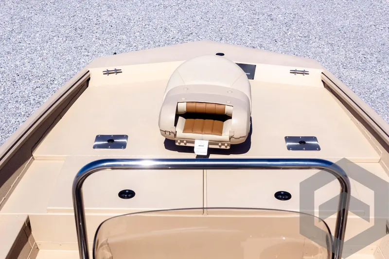 Slide: The Image of 2025 G3 Bay 20 boat interior with seating and console, featuring a sleek design. - 29