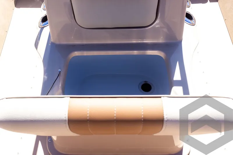 Slide: The Image of 2025 G3 Bay 20 boat interior with storage compartment and cushioned seating. - 34
