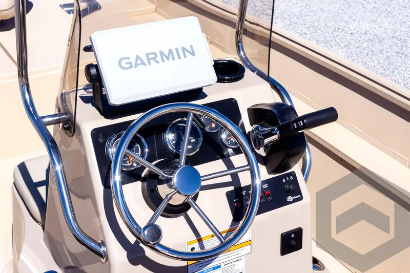 Slide: The Image of 2025 G3 Bay 20 boat console with Garmin navigation system and steering wheel. - 39