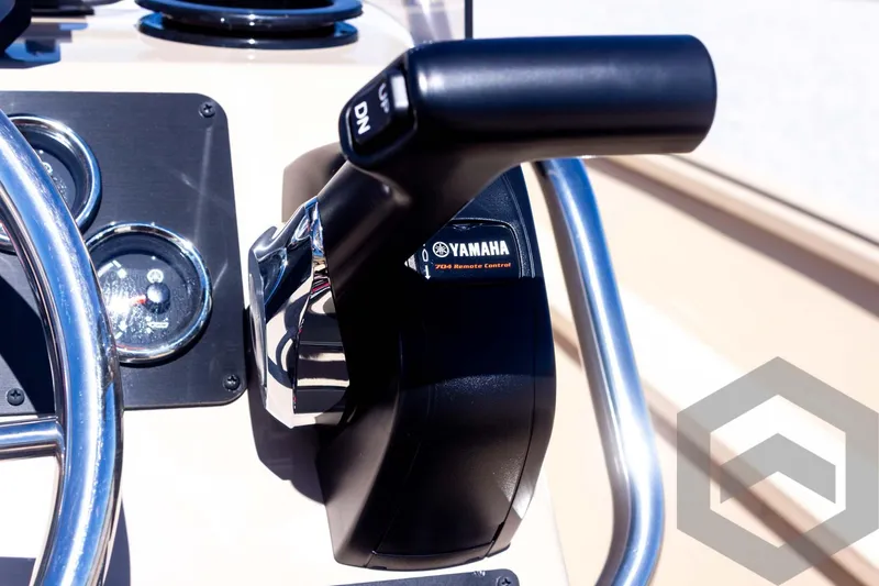 Slide: The Image of Close-up of 2025 G3 Bay 20 boat throttle control with Yamaha branding. - 42
