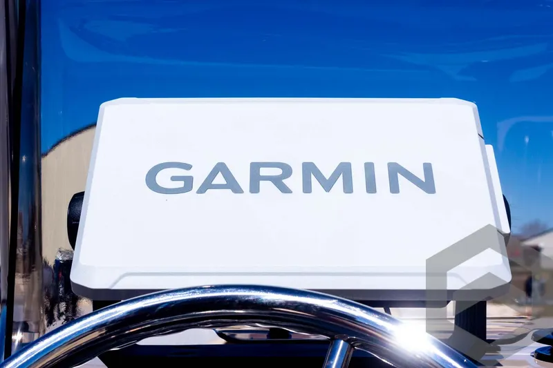 Slide: The Image of Garmin device on 2025 G3 Bay 20 boat, steering wheel visible. - 46