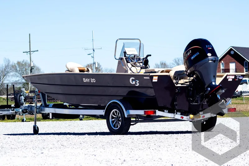 Slide: The Image of 2025 G3 Bay 20 boat on trailer, featuring Yamaha outboard motor. - 8