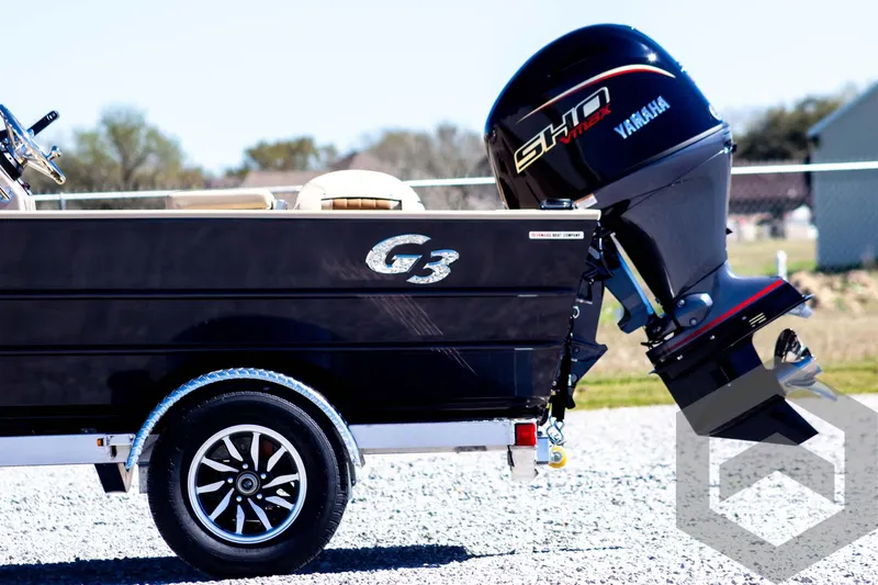 Slide: The Image of 2025 G3 Bay 20 boat with Yamaha outboard motor on a trailer. - 9
