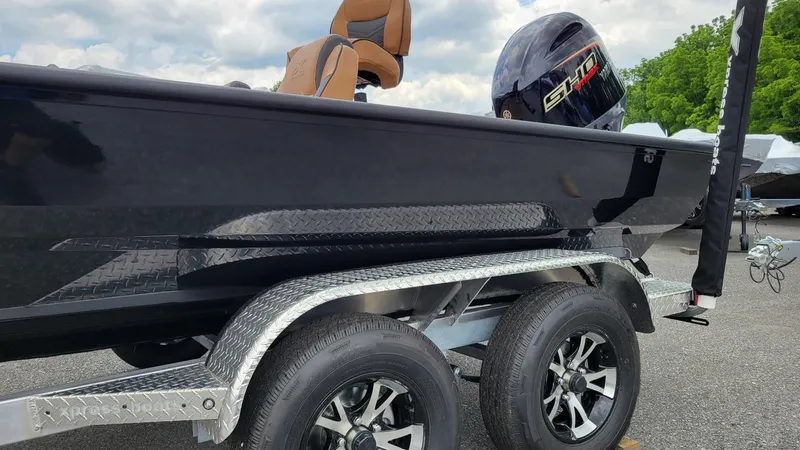 Slide: The Image of 2026 Xpress H20 Bass boat with Yamaha Vmax 175 engine on trailer. - 10