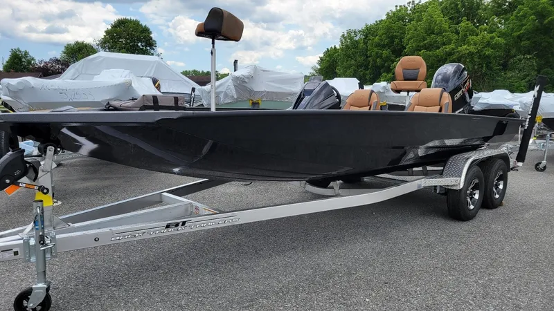 Slide: The Image of 2026 Xpress H20 Bass boat with Yamaha Vmax 175, on trailer, outdoors. - 3