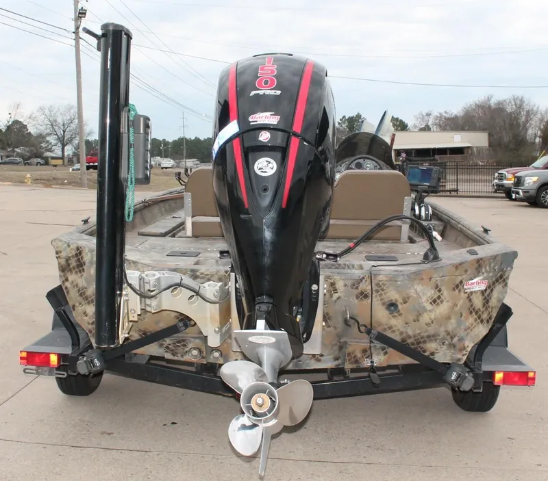 Slide: The Image of 2023 Excel Catfish Pro 21 Side Console boat with powerful outboard motor. - 6