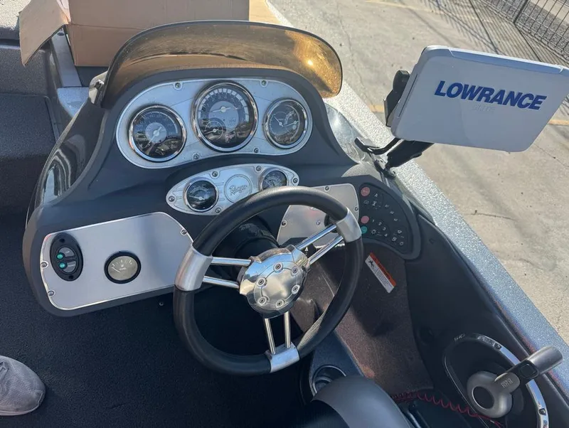 Slide: The Image of Dashboard of a 2007 Ranger Z21 Comanche boat with Lowrance navigation system. - 19