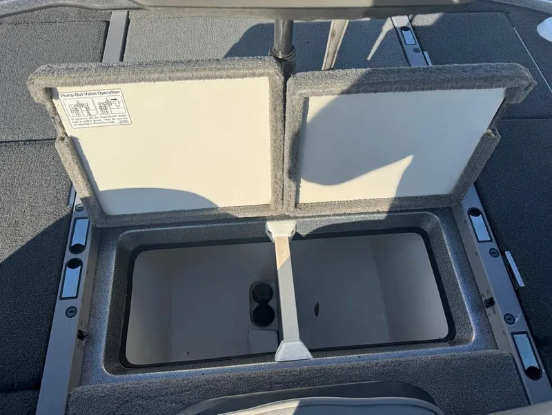 Slide: The Image of Open storage compartment on a 2007 Ranger Z21 Comanche boat deck. - 3