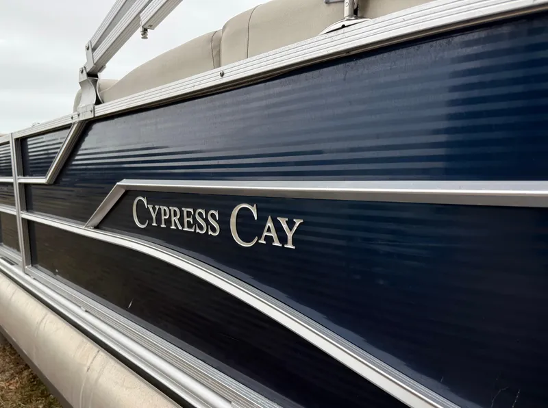 Slide: The Image of 2022 Cypress Cay Seabreeze 232 pontoon boat, side view with logo. - 8