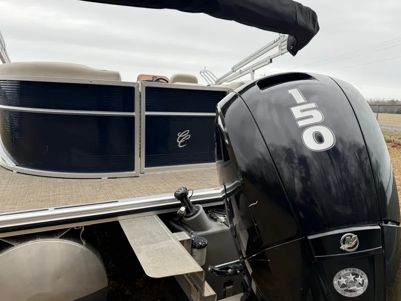 Slide: The Image of 2022 Cypress Cay Seabreeze 232 pontoon boat with 150 HP engine, rear view. - 9