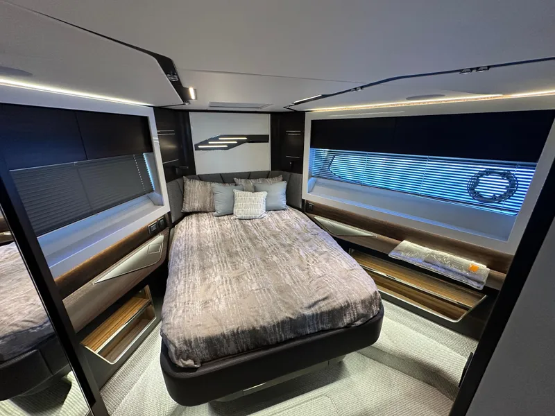 Slide: The Image of Luxurious bedroom interior of 2023 Sunseeker 65 Sport Yacht with modern design and ambient lighting. - 16