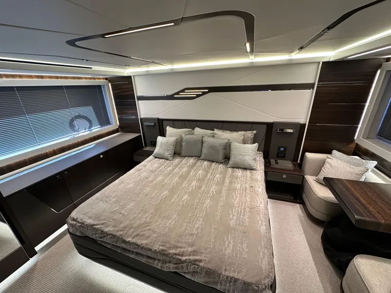 Slide: The Image of Luxurious bedroom interior of 2023 Sunseeker 65 Sport Yacht with modern design and elegant furnishings. - 17