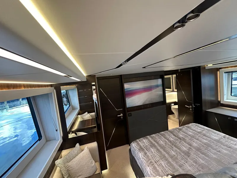 Slide: The Image of Luxurious interior of 2023 Sunseeker 65 Sport Yacht with modern design and large windows. - 28