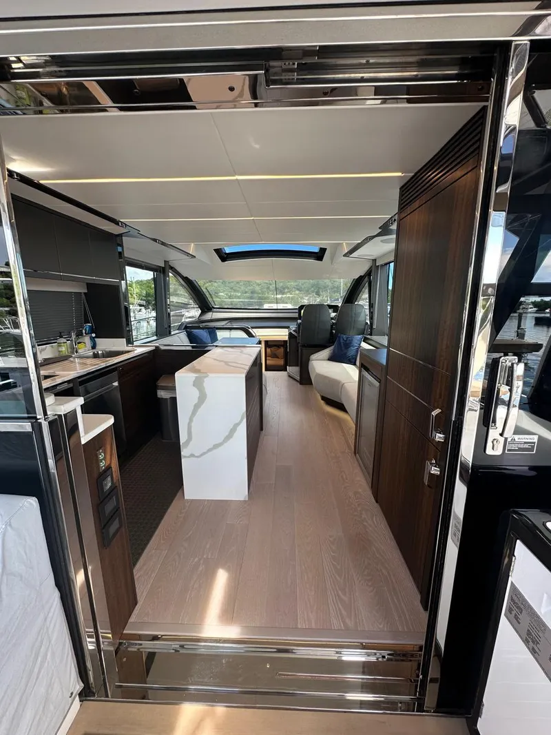 Slide: The Image of Interior of 2023 Sunseeker 65 Sport Yacht, featuring modern design and luxurious amenities. - 29