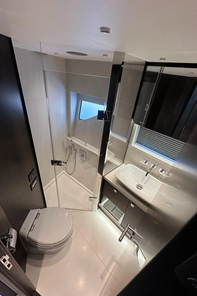 Slide: The Image of Luxurious bathroom in 2023 Sunseeker 65 Sport Yacht with modern fixtures and sleek design. - 36