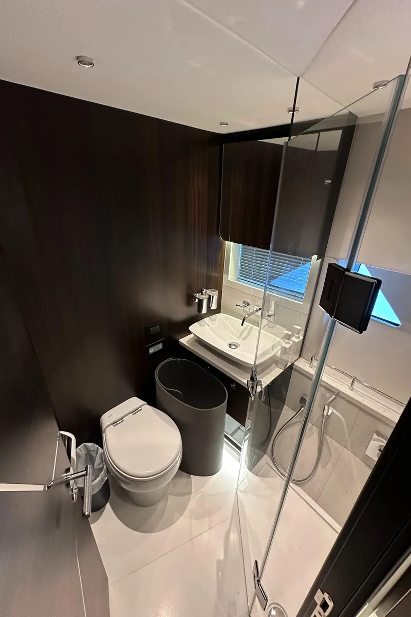 Slide: The Image of Luxurious bathroom in 2023 Sunseeker 65 Sport Yacht with modern fixtures and sleek design. - 37
