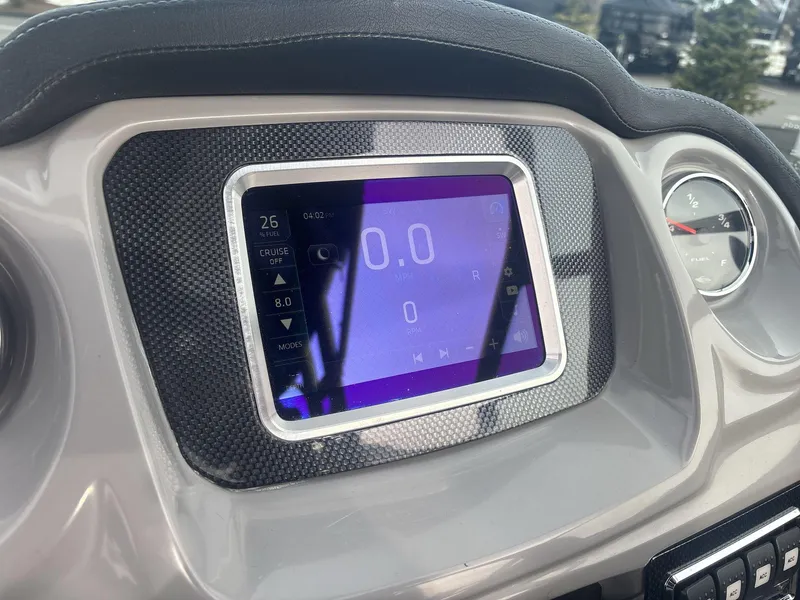 Slide: The Image of 2017 Chaparral 203 Vortex dashboard with digital display and fuel gauge. - 10