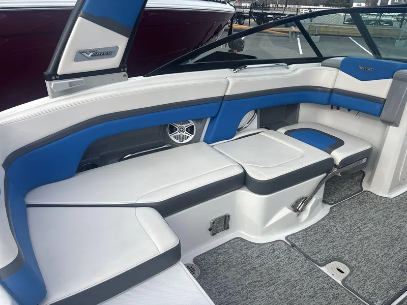Slide: The Image of 2017 Chaparral 203 Vortex boat interior with blue and white seating. - 13