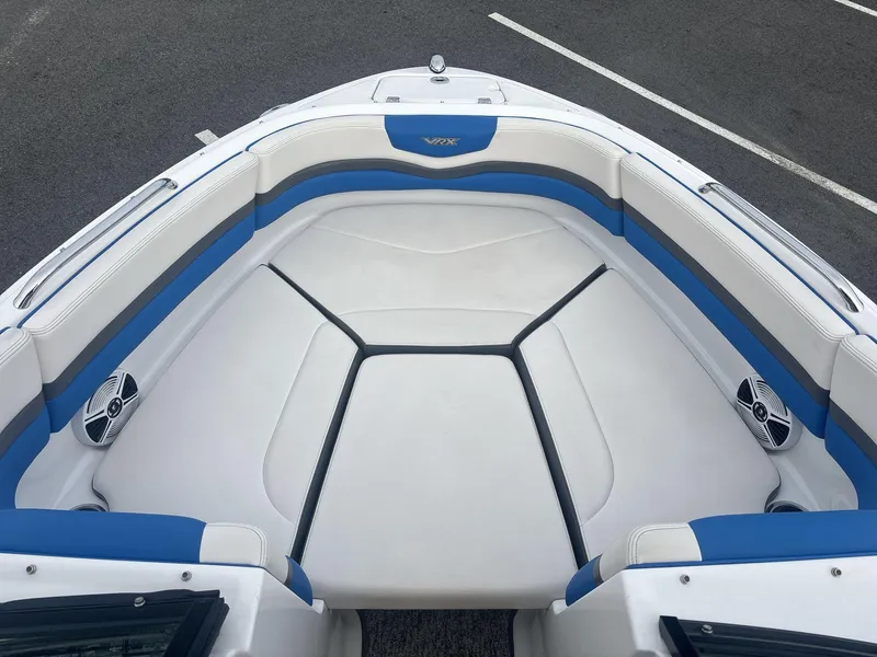 Slide: The Image of 2017 Chaparral 203 Vortex boat interior with blue and white seating. - 6