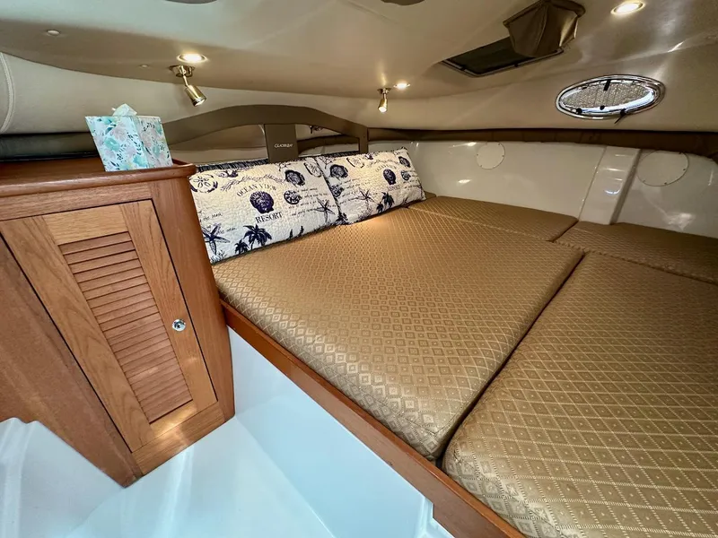 Slide: The Image of Luxurious cabin interior of 2009 Glacier Bay 3080 boat with cozy bedding. - 19