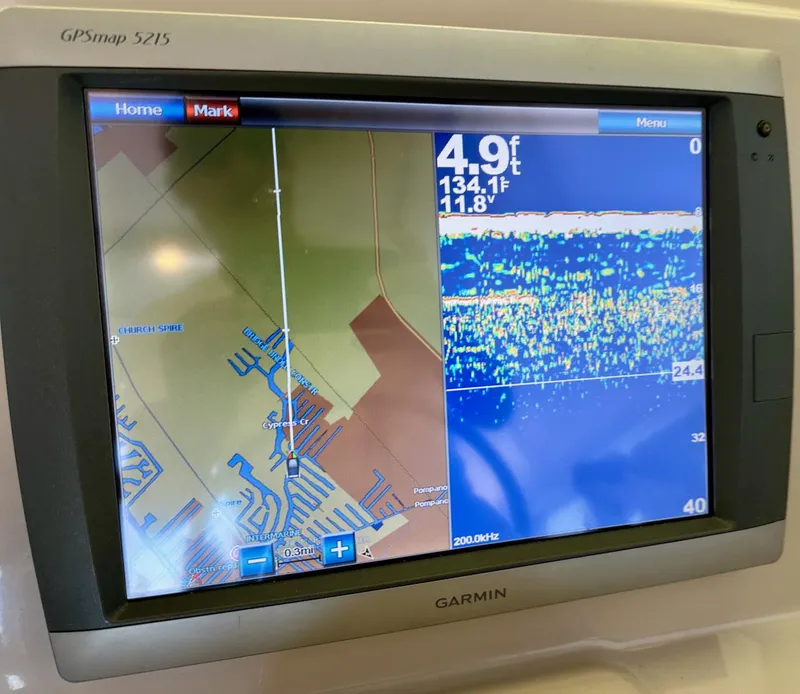 Slide: The Image of Garmin GPSmap 5215 displaying navigation and sonar data on Glacier Bay 3080, 2009 model. - 6