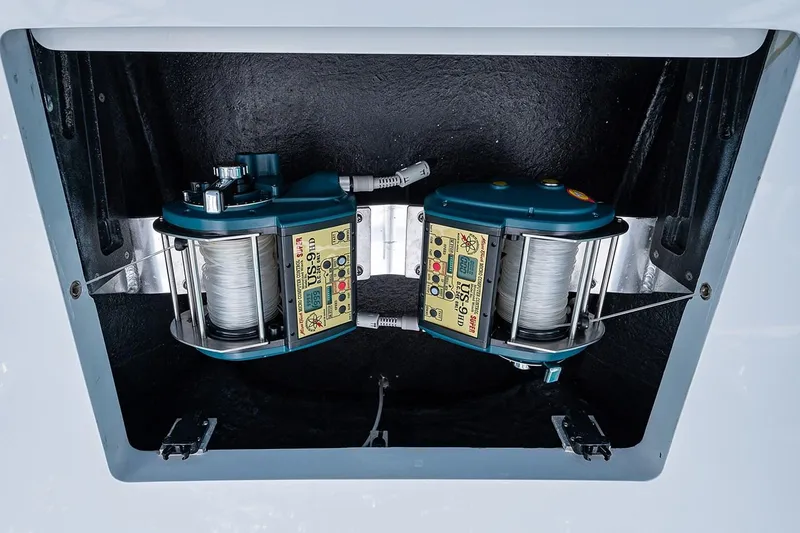 Slide: The Image of Dual electric fishing reels on a 2008 Hatteras 68 Convertible yacht. - 39