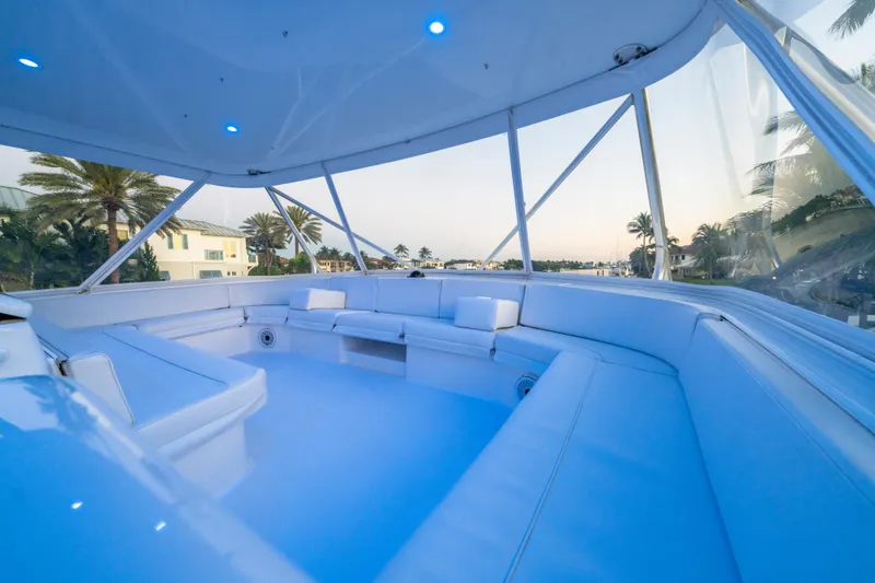 Slide: The Image of Luxurious seating area on 2008 Hatteras 68 Convertible yacht, with scenic views. - 36