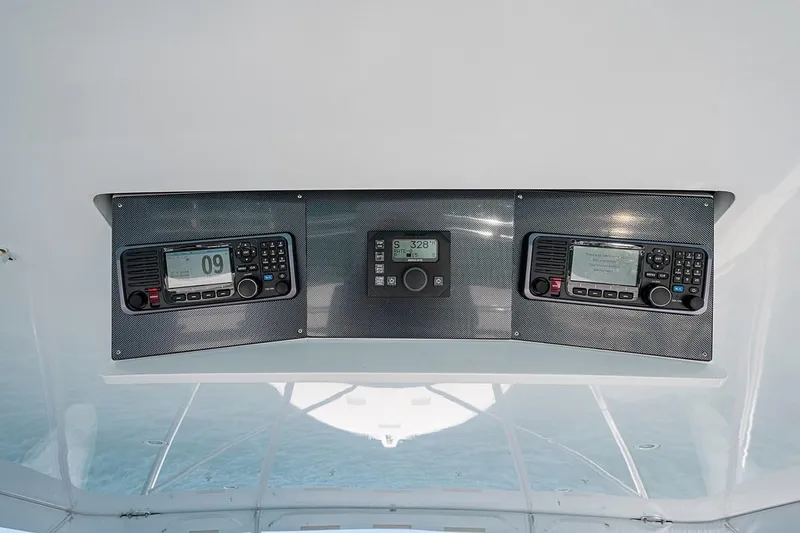 Slide: The Image of Control panel of 2008 Hatteras 68 Convertible yacht with navigation equipment. - 38