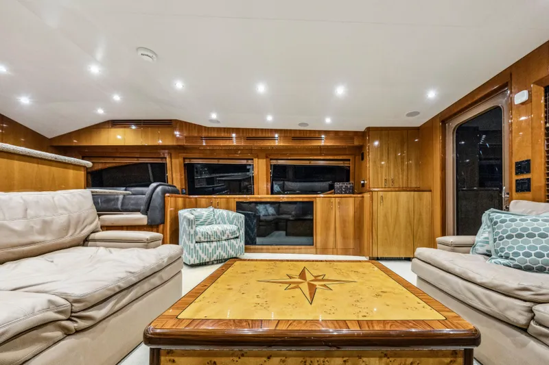 Slide: The Image of Luxurious interior of 2008 Hatteras 68 Convertible yacht with elegant wood finishes. - 48
