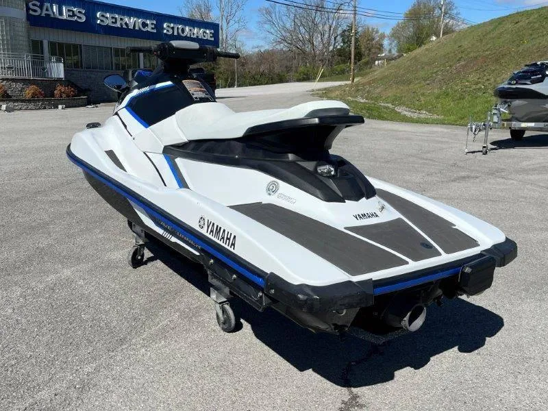 Slide: The Image of 2017 Yamaha WaveRunner EX Sport jet ski parked outside sales service storage. - 12